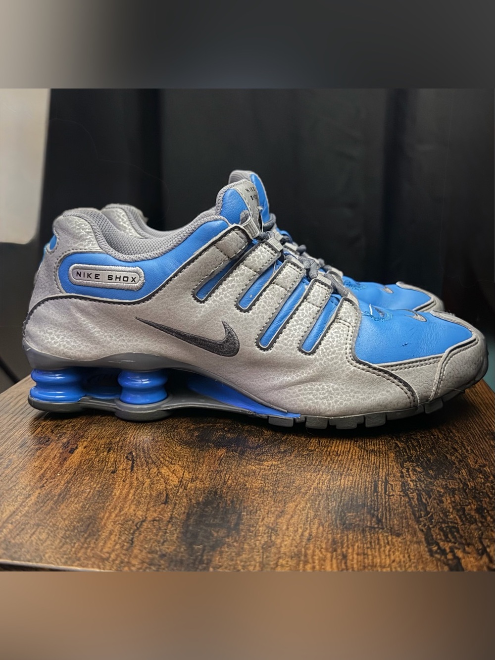 Nike Shox Women’s 7 Blue and Gray Running Sneakers “UK” on the heel.